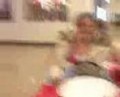 Erin Attempting to Ride the Car