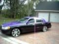 purple and black lincoln towncar