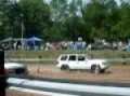 racin a white jeep in the right lane